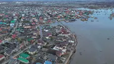 epa11273190 An aerial photo taken with a drone shows the flooded residential area of the outskirts of Orenburg, Orenburg region, Russia, 11 April 2024. The flood situation in the Orenburg region has reached its peak; the most difficult situation is in Orenburg, regional governor Denis Pasler told Russian President Putin. According to the Russian Ministry of Emergency Situations, the water level in the Ural River has risen to 1060 cm. 2028 residential buildings and 2522 household plots remain in the flood zone. The authorities of the Orenburg region reported that 7.8 thousand people, including 2,117 children, were evacuated from flooded households and personal plots. The most difficult flood situation remains in Orsk, Orenburg, Orenburg and Ilek regions. EPA/STRINGER