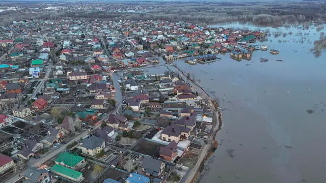 epa11273190 An aerial photo taken with a drone shows the flooded residential area of the outskirts of Orenburg, Orenburg region, Russia, 11 April 2024. The flood situation in the Orenburg region has reached its peak; the most difficult situation is in Orenburg, regional governor Denis Pasler told Russian President Putin. According to the Russian Ministry of Emergency Situations, the water level in the Ural River has risen to 1060 cm. 2028 residential buildings and 2522 household plots remain in the flood zone. The authorities of the Orenburg region reported that 7.8 thousand people, including 2,117 children, were evacuated from flooded households and personal plots. The most difficult flood situation remains in Orsk, Orenburg, Orenburg and Ilek regions. EPA/STRINGER