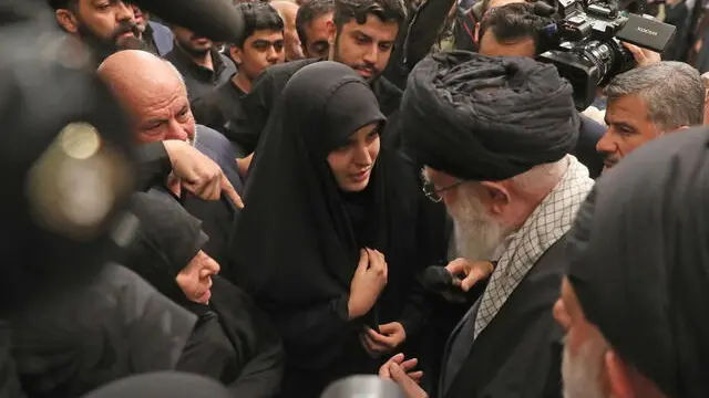 epa11259193 A handout photo made available by the Iranian supreme leader office shows Iranian Supreme Leader Ayatollah Ali Khamenei (R) talking with families and relatives of the Iranian revolutionary guards corps (IRGC) who were killed in Syria, ahead of their funeral in Tehran, Iran, 04 April 2024. According to Iranian state media quoting the Islamic Revolutionary Guard Corps, at least seven IRGC military advisors, including two generals, were killed in an airstrike on the Iranian consulate building in Syria's capital Damascus on 01 April. Iran has blamed Israel for the attack and vowed to respond. Iranians will hold a funeral ceremony for them on 05 April 2024. EPA/IRANIAN SUPREME LEADER OFFICE / HANDOUT HANDOUT EDITORIAL USE ONLY/NO SALES HANDOUT EDITORIAL USE ONLY/NO SALES