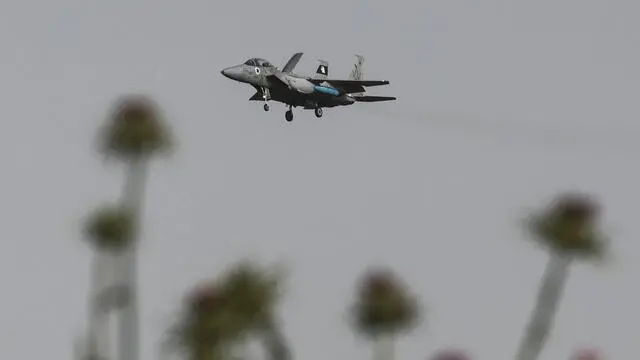 epa11246817 An Israeli Air Force F15 fighter jet in the air near the city of Gedera, southern Israel, 27 March 2024. The Israeli Defence Forces announced that the Israeli Air Force is to resume its training program for the current year of war, including increased readiness for conflict in the northern areas. More than 30,000 Palestinians and over 1,300 Israelis have been killed, according to the Palestinian Health Ministry and the Israel Defense Forces (IDF), since Hamas militants launched an attack against Israel from the Gaza Strip on 07 October 2023, and the Israeli operations in Gaza and the West Bank which followed it. EPA/ABIR SULTAN