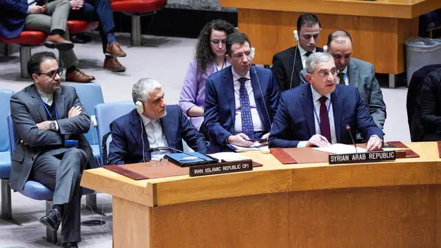 epa11130026 Syria representative at the United Nations, Ambassador Qusay Al-Dahhak (R) speaks next to Amir Saeid Iravani, Permanent Representative of the Islamic Republic of Iran during a United Nations Security Council meeting, which was called by Russia in response to recent airstrikes by the United States in Iraq and Syria, at United Nations headquarters in New York, New York, USA, 05 February 2024. The United States launched the attacks following a recent drone attack on a US base in Jordan that killed three US soldiers. EPA/EDUARDO MUNOZ