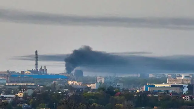 epa11271839 A cloud of smoke rises above a site following a rocket attack in Kharkiv, northeastern Ukraine, 11 April 2024, amid the Russian invasion. According to the Air Force Command of the Armed Forces of Ukraine, some 42 Russian rockets of different classes and 40 shock drones where launched on Kharkiv early 11 April 2024, with 18 rockets and 39 shock drones among them intercepted. Russian troops entered Ukrainian territory on 24 February 2022, starting a conflict that has provoked destruction and a humanitarian crisis. EPA/SERGEY KOZLOV