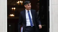 epa11231067 British Prime Minister Rishi Sunak departs 10 Downing Street to attend the Prime Minister's Questions (PMQs) at the Parliament in London, Britain, 20 March 2024. EPA/ANDY RAIN