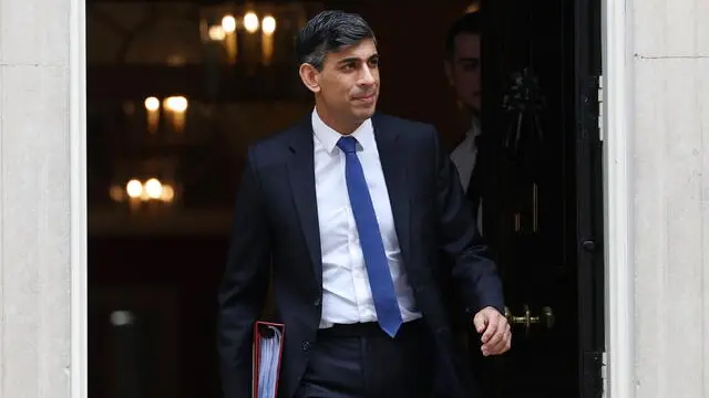 epa11231067 British Prime Minister Rishi Sunak departs 10 Downing Street to attend the Prime Minister's Questions (PMQs) at the Parliament in London, Britain, 20 March 2024. EPA/ANDY RAIN
