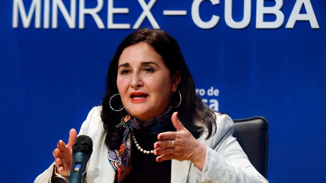 epa11281144 Johana Tablada, Deputy Director General for the United States of the Cuban Foreign Ministry, speaks during a press conference at the headquarters of the International Press Center in Havana, Cuba, 15 April 2024. Cuba assured that if the United States "really wanted" to reduce the migratory flow of Cubans on its southern border with Mexico, it would "remove" Cuba from the list of countries sponsoring terrorism, of which it has been a member since 2021. EPA/Ernesto Mastrascusa