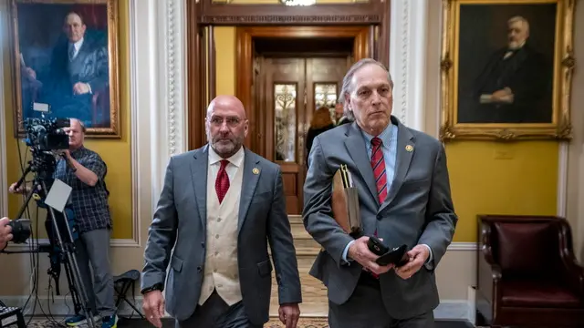 epa11285386 House impeachment managers Republican Representative from Louisiana Clay Higgins (L) and Republican Representative from Arizona Andy Biggs (R) walk off the Senate floor following the dismissal of impeachment proceedings against US Secretary of Homeland Security Alejandro Mayorkas in Washington, DC, USA, 17 April 2024. Senate Democrats dismissed the articles of impeachment before the trial began. EPA/SHAWN THEW