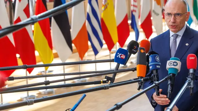 epa11286111 Enrico Letta, former President of the Italian Council and President of the Jacques Delors Institute and author of the High-Level Report on the future of the Single Market speaks with the press on the second day of a special meeting of the European Council in Brussels, Belgium, 18 April 2024. EU leaders gather in Brussels for a two-day summit to discuss the economy and competitiveness among other issues. EPA/OLIVIER MATTHYS