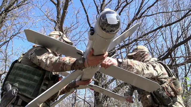 epa11269493 A still image taken from a handout video provided by the Russian Defence Ministry press-service, shows an army crew of the UAV â€˜Zallaâ€™ of the â€˜Southernâ€™ group of the Russian forces preparing a loitering ammunition â€˜Lancetâ€™ against Ukrainian troops at an undisclosed location ins the Russian controlled part of Ukraine, Zaporizhzhia region, Ukraine 10 April 2024. According to the Russian Defence Ministry, crews of 2S5 Giatsint-S self-propelled artillery units are conducting counter-battery combat, striking at Ukrainian army ammunition depots and other strongholds. Russian troops entered Ukrainian territory on 24 February 2022, starting a conflict that has provoked destruction and a humanitarian crisis. EPA/RUSSIAN DEFENCE MINISTRY PRESS SERVICE/HANDOUT HANDOUT HANDOUT EDITORIAL USE ONLY/NO SALES HANDOUT EDITORIAL USE ONLY/NO SALES HANDOUT EDITORIAL USE ONLY/NO SALES