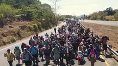 epa11245610 Migrants walk in a caravan called 'Viacrucis migrant' which heads towards Mexico City, in Tapachula, Mexico, 26 March 2024. The thousands of members of the 'Viacrucis migrant caravan' asked the Mexican Government this 26 March for free movement to leave Chiapas, a state on the southern border, and not to be stopped by the agents of the National Migration Institute (INM), who carry out patrols near their transit. EPA/Juan Manuel Blanco