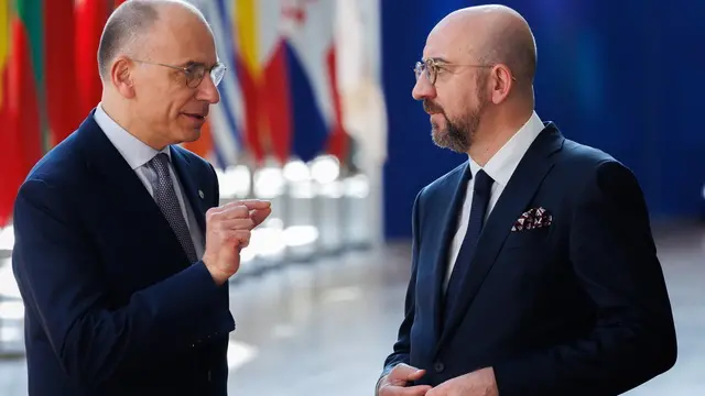 epa11286041 Enrico Letta (L), former President of the Italian Council and President of the Jacques Delors Institute and author of the High-Level Report on the future of the Single Market speaks with EU Council President Charles Michel upon arrival on the second day of a special meeting of the European Council in Brussels, Belgium, 18 April 2024. EU leaders gather in Brussels for a two-day summit to discuss the economy and competitiveness among other issues. EPA/OLIVIER MATTHYS