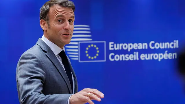 epa11284994 French President Emmanuel Macron arrives to attend a roundtable during a special meeting of the European Council in Brussels, Belgium, 17 April 2024. EU leaders gather in Brussels for a two-day summit to discuss the economy and competitiveness, as well as Ukraine, Turkey and the Middle East, including Lebanon, among other issues. EPA/OLIVIER MATTHYS