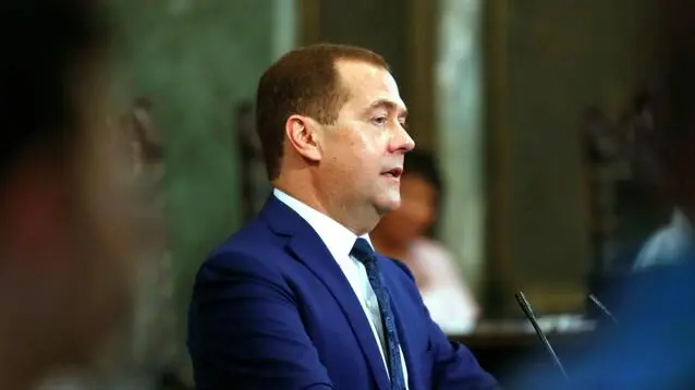 epa07895736 Russian Prime Minister Dmitri Medvedev delivers a speech during the ceremony where he has been invested with the title of Doctor Honoris Causa in Political Science, in Havana, Cuba, 04 October 2019. Medvedev is on his second day of an official visit to the island. EPA/YANDER ZAMORA