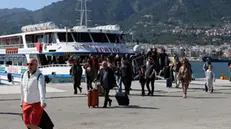 epa11272197 Turkish tourists arrive at the port of Mytilini, Lesvos Island, Greece, 11 April 2024. Greece has introduced a special visa-express program specifically made for Turkish tourists, as of 01 April 2024, which gives them the opportunity to access 10 Greek islands without the need to obtain a visa beforehand. Turkish tourists arriving at these islands can purchase a visa upon arrival, which permits a stay for seven days.The islands included in this initiative are Rhodes, Chios, Kos, Lesbos, Samos, Kalymnos, Leros, Kastellorizo, Symi and Limnos. EPA/ELIAS MARCOU