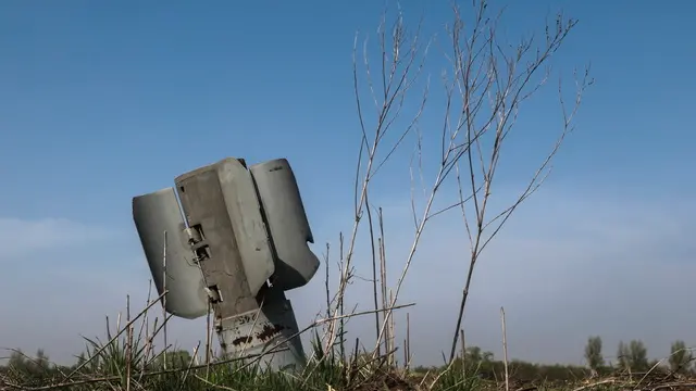 epaselect epa11274981 Debris of a self-propelled 220 mm rocket lies in a field near the village of Novoyakovlivka, Zaporizhzhia area, Ukraine, 12 April 2024 amid the Russian invasion. Ukrainian farmer Ivan (49) has been farming for almost 24 years. The area of his farm is more than 1,000 hectares of which about 300 hectares cannot be cultivated due to intense shelling. Tractor drivers and harvesters sometimes work under shelling because the fields are 10-12 km from the frontline, the farmer said. His farm rows winter wheat, winter rape, sunflower and corn. Russian troops entered Ukrainian territory on 24 February 2022, starting a conflict that has provoked destruction and a humanitarian crisis. EPA/KATERYNA KLOCHKO