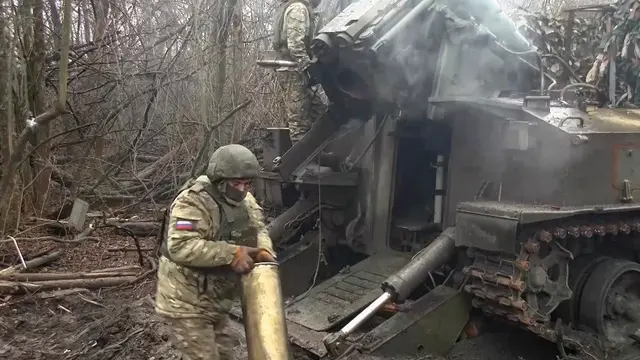 epa11269496 A still image taken from a handout video provided by the Russian Defence ministry press-service shows Russian combat work of crews of SA 2C5 â€˜Hyacinth-Sâ€™ of â€˜Vostokâ€™ (East) troops against Ukrainian troops at an undisclsoed location on South-Donetsk direction in the Russian controlled part of Ukraine, Donetsk region, 10 April 2024. According to the Russian Defence Ministry, crews of 2S5 Giatsint-S self-propelled artillery units are conducting counter-battery combat, striking at Ukrainian army ammunition depots and strongholds. EPA/RUSSIAN DEFENCE MINISTRY PRESS SERVICE/HANDOUT HANDOUT HANDOUT EDITORIAL USE ONLY/NO SALES HANDOUT EDITORIAL USE ONLY/NO SALES HANDOUT EDITORIAL USE ONLY/NO SALES