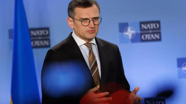epa11258442 Ukraine's Foreign Minister Dmytro Kuleba delivers a statement during NATO’s 75th anniversary celebration in the Agora to commemorate 75 years of NATO foundation during a North Atlantic Treaty Organization (NATO) Foreign Affairs Ministers meeting in Brussels, Belgium, 04 April 2024. Allied Foreign Affairs Ministers attend a meeting of NATO Ministers of Foreign Affairs at NATO Headquarters in Brussels on 03-04 April as NATO celebrates its 75th anniversary. On 04 April 1949, the 12 founding countries signed the North Atlantic Treaty, called the Washington Treaty. It committed each member to share the risk, responsibilities, and benefits of collective defense. EPA/OLIVIER MATTHYS