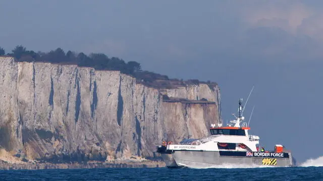 epa11202039 A UK Border Force ship cruises past the White Cliffs of Dover as it brings in migrants rescued from the English Channel on a small boat crossing, on 06 March 2024. The UK government has suffered more setbacks at the House of Lords recently on its plan to send migrants to Rwanda to deter the Channel crossings. Despite the British and French government's efforts to prevent migrants from making the dangerous journey on small boats, many are willing to take the risk to claim asylum in the UK. EPA/TOLGA AKMEN