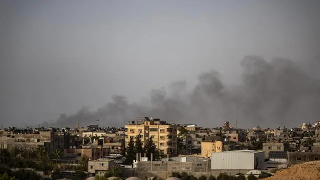 epa11290475 Smoke rises from Rafah refugee camp, in Rafah, southern Gaza Strip, 20 April 2024, after an Israeli air strike. More than 34,000 Palestinians and over 1,450 Israelis have been killed, according to the Palestinian Health Ministry and the Israel Defense Forces (IDF), since Hamas militants launched an attack against Israel from the Gaza Strip on 07 October 2023, and the Israeli operations in Gaza and the West Bank which followed it. EPA/HAITHAM IMAD