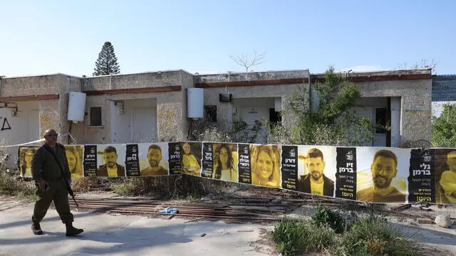 epa11264167 Pictures are displayed of Israeli hostages held by Hamas in Gaza since the October 07 attack in Kibbutz Kfar Aza, near the border with Gaza in southern Israel, 07 April 2024. Israel marks six months since the October 07 attack. According to Israeli IDF 134 israeli hostages are being held by Hamas in Gaza. EPA/ABIR SULTAN