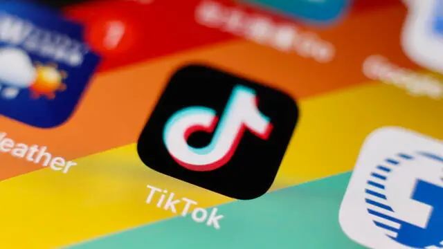 epa10351129 The Tiktok application logo is pictured on a smartphone in Taipei, Taiwan, 06 December 2022. On 02 December, the The US Federal Bureau of Investigation (FBI) warned about Tiktok, that it presents national security concerns in regards to the integrity of the application's algorithm. On 05 December, a Ministry of Digital Affairs (MODA) official announced that the application have been deemed to be 'harmful product against national information security.' EPA/RITCHIE B. TONGO