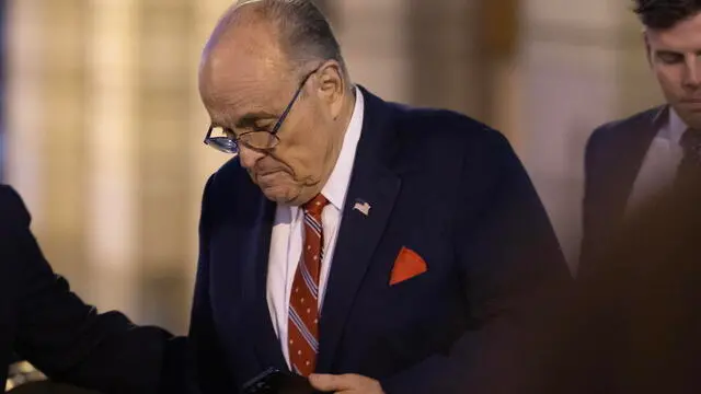 epa11030207 Rudy Giuliani, former New York City mayor and former attorney for former president Trump, departs the US District Court at the end of the day during his ongoing defamation case brought by two Fulton County election workers in Washington, DC, USA, 14 December 2023. Two Atlanta workers Ruby Freeman and Shane Moss successfully sued Giuliani for defamation after they were harassed following Giuliani's false election claims. The DC jury will now determine how much Giuliani will have to pay them. EPA/MICHAEL REYNOLDS