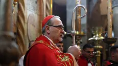 epa11240664 Apostolic Administrator of the Latin Church in the Holy land Pierbattista Pizzaballa attends the Palm Sunday procession at the Holy Sepulcher church in Jerusalemâ€™s old city, 24 March 2024. Palm Sunday is the biblical account of Jesus Christ's entry into Jerusalem, which ushers in Holy Week and Lent. EPA/ATEF SAFADI