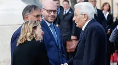 epa11299359 Italian President Sergio Mattarella (R) shakes hands with Italian Prime Minister Giorgia Meloni (L) next to Italian Senate President Ignazio La Russa (2-L) and President of the Chamber of Deputies Lorenzo Fontana during a wreath-laying ceremony at the Altar of the Fatherland (Altare della Patria) to commemorate the 79th Liberation Day, in Rome, Italy, 25 April 2024. Liberation Day (Festa della Liberazione) is a nationwide public holiday in Italy that is annually celebrated on 25 April. The day remembers Italians who fought against the Nazis and Mussolini's troops during World War II and honors those who served in the Italian Resistance. EPA/GIUSEPPE LAMI