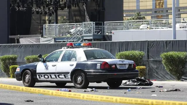 epa06240532 A police car near the scene of the mass shooting at the Route 91 Harvest festival on Las Vegas Boulevard in Las Vegas, Nevada, USA, 02 October 2017. The mass shooting, which left at least 58 people dead and more than 500 injured, is the largest in modern US history. EPA/EUGENE GARCIA