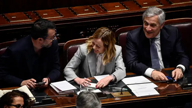 Italian Prime Minister Giorgia Meloni (C) with Italian Minister of Foreign Affairs, Antonio Tajani (R), and Minister of Infrastructures, Matteo Salvini (L), during a session in the Chamber of Deputies, as she reported to the Lower House ahead of the European Council taking place in Brussels on 21 and 22 March, Rome, Italy, 20 Marcxh 2024. ANSA/RICCARDO ANTIMIANI