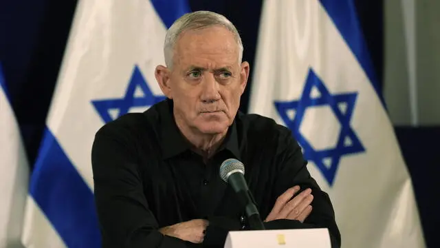 epa10945802 Israel's Cabinet Minister Benny Gantz looks on during a press conference in The Kirya military base in Tel Aviv, Israel, 28 October 2023. EPA/ABIR SULTAN / POOL