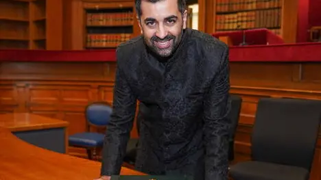 epa10548548 A handout photo made available by the Scottish Government shjows Scottish National Party (SNP) leader Humza Yousaf posing with the Great Seal of Scotland at the Court of Session after being sworn in as First Minister of Scotland, in Edinburgh, Scotland, Britain, 29 March 2023. Yousaf will now start to appoint his cabinet. EPA/CROWN COPYRIGHT / HANDOUT MANDATORY CREDIT: CROWN COPYRIGHT HANDOUT EDITORIAL USE ONLY/NO SALES