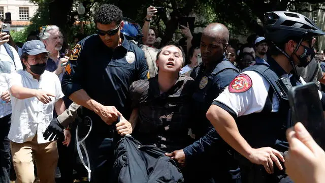 epa11309316 A student gets arrested by Austin police officers at a Protect Palestine Rally on the University of Texas at Austin campus in Austin, Texas, USA, 29 April 2024. Campus police officers from the University of Texas at Austin and state troopers in riot gear arrested dozens of pro-Palestinian protesters who had erected a small number of tents on a central mall of the university. More than 34,000 Palestinians and over 1,450 Israelis have been killed, according to the Palestinian Health Ministry and the Israel Defense Forces (IDF), since Hamas militants launched an attack against Israel from the Gaza Strip on 07 October 2023, and the Israeli operations in Gaza and the West Bank which followed it. EPA/ADAM DAVIS