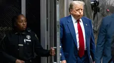 epa11310499 Former US President Donald Trump returns to the courtroom following a short break in his criminal trial at New York State Supreme Court in New York, New York, USA, 30 April 2024. Trump is facing 34 felony counts of falsifying business records related to payments made to adult film star Stormy Daniels during his 2016 presidential campaign. EPA/JUSTIN LANE / POOL