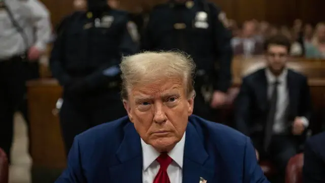 epa11310247 Former US President Donald Trump awaits the start of proceedings of his criminal trial at the New York State Supreme Court in New York, New York, USA, 30 April 2024. Trump is facing 34 felony counts of falsifying business records related to payments made to adult film star Stormy Daniels during his 2016 presidential campaign. EPA/VICTOR J. BLUE / POOL