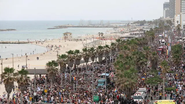 epa10680085 People take part in the annual Gay Pride parade along the beach in Tel Aviv, Israel, 08 June 2023. This year Tel Aviv municipality marks 25 years since the first Pride parade in 1998 and expects hundreds of thousands to take part in the Pride events. EPA/ABIR SULTAN