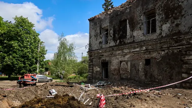 epa11304559 Communal workers operate at the site of a rocket attack on a regional psychiatric hospital in Kharkiv, northeastern Ukraine, 27 April 2024. According to the Regional Prosecutor's Office Russia hit the city with two missiles of the S-300 type from the territory of the Belgorod region. In total, Russia used 34 air, ground, and sea-based missiles for the night time shelling of Ukraine as Air Force Command of UA Armed Forces reported. 21 were shot down by Ukrainian troops. As a result of the attack, the enterprise equipment of the four thermal power plants was seriously damaged according to the DTEK Group energy holding report. EPA/SERGEY KOZLOV