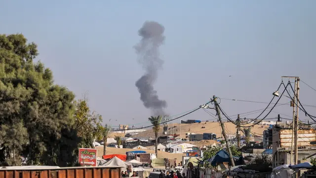 epa11326104 Smoke rises after an Israeli air strike in Rafah, southern Gaza Strip, 07 May 2024 (issued 08 May 2024). The Israel Defence Forces (IDF) on 06 May called on residents of eastern Rafah to 'temporarily' evacuate to an expanded humanitarian area. On 07 May the IDF stated that its ground troops began an overnight operation targeting Hamas militants and infrastructure within specific areas of eastern Rafah, taking operational control of the Gazan side of the Rafah crossing based on intelligence information. More than 34,600 Palestinians and over 1,455 Israelis have been killed, according to the Palestinian Health Ministry and the IDF, since Hamas militants launched an attack against Israel from the Gaza Strip on 07 October 2023, and the Israeli operations in Gaza and the West Bank which followed it. EPA/MOHAMMED SABER