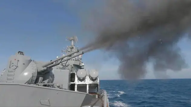 epa09768521 A handout still image taken from handout video made available by the Russian Defence Ministry press service shows Russian cruiser Moskva of the Black Sea Fleet conducting an artillery battle and destroying a mock enemy submarine in Black Sea near Sevastopol, Crimea, 18 February 2022. Since January 20, a series of major exercises have been taking place on all four fleets of the Russian Navy and the Caspian Flotilla. The Russian Defense Ministry reported that 140 ships and vessels, as well as over 10 thousand military personnel, are participating in them. Six large landing ships are transferred to the Black Sea from the Northern and Baltic Fleets. Two Project 1164 Atlant heavy missile cruiser, Varyag and Marshal Ustinov, are already in the Mediterranean, and a third, Moskva, may join them. Each of them is armed with 16 Vulkan anti-ship missiles. EPA/RUSSIAN DEFENCE MINISTRY PRESS SERVICE HANDOUT HANDOUT EDITORIAL USE ONLY/NO SALES