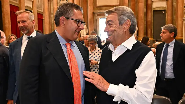 Il presidente della regione Liguria Giovanni Toti (S) e l'imprenditore Aldo Spinelli, in una foto d'archivio. Genova, 07 maggio 2024. ANSA/LUCA ZENNARO