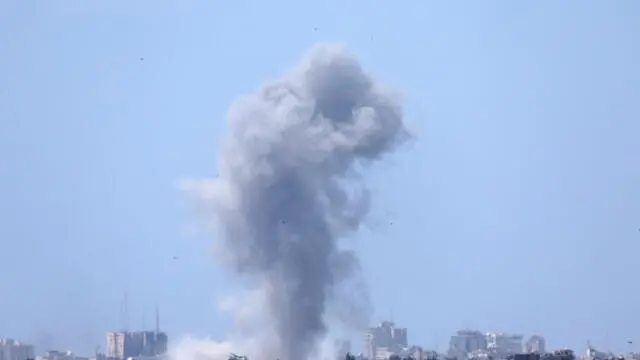epa11335023 Smoke rises as a result of an Israeli air strike in the northern part of the Gaza Strip, as seen from the Israeli side of the border, southern Israel, 12 May 2024. More than 34,900 Palestinians and over 1,455 Israelis have been killed, according to the Palestinian Health Ministry and the Israel Defense Forces (IDF), since Hamas militants launched an attack against Israel from the Gaza Strip on 07 October 2023, and the Israeli operations in Gaza and the West Bank which followed it. EPA/ATEF SAFADI