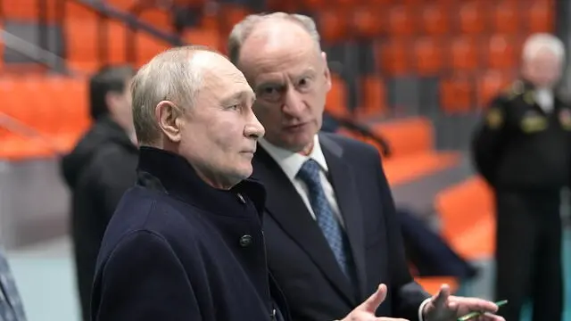 epa11106764 Russian President Vladimir Putin (L) and Russian Security Council secretary Nikolai Patrushev (R) inspect the sports hall during his visit to St. Petersburg State Maritime Technical University, in St. Petersburg, Russia, 26 January 2024. EPA/ALEXEI DANICHEV / SPUTNIK / KREMLIN POOL MANDATORY CREDIT