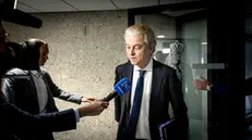 epa11341476 Party for Freedom (PVV) leader Geert Wilders (R) speaks to journalists on the last day of government formation talks, in the Hague, the Netherlands, 15 May 2024. Dutch party leaders of PVV, VVD, NSC and BBB on 15 May reach a deadline to agree on forming the next government. EPA/KOEN VAN WEEL