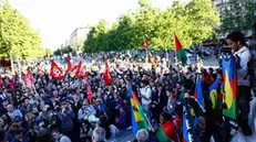 epa11346112 Protesters participate in a rally called by Caledonian activists in solidarity with Kanak people, at Place de la Republique in Paris, France, 16 May 2024. The French territory of New Caledonia has experienced three nights of clashes in response to a reform to electoral procedures, which the indigenous Kanak population believes will diminish their vote. France has declared a state of emergency and deployed its military to the territory's ports and international airport in response to the unrest, which has resulted in at least four deaths and hundreds of wounded. EPA/MOHAMMED BADRA