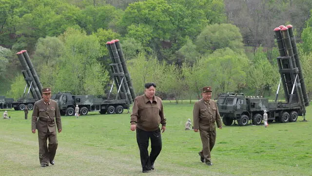epa11294997 A photo released by the official North Korean Central News Agency (KCNA) shows North Korean leader Kim Jong Un (C) overseeing a simulated nuclear counterattack drill at an undisclosed location, North Korea, 22 April 2024 (issued 23 April 2024). According to KCNA, North leader Kim Jong Un on 22 April 'guided a combined tactical drill simulating a nuclear counterattack involving super-large multiple rocket artillerymen'. EPA/KCNA EDITORIAL USE ONLY EDITORIAL USE ONLY