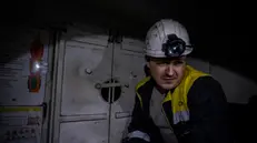 epa11266002 An Ukrainian miner prepares to go down in one of the shafts of a coal mine in Pavlohrad, Ukraine, 08 april 2024. According to mine operators, among the more than 4.000 workers, there are 600 women and more than a hundred work in technical positions underground after the Ukrainian government changed the law in 2023 when many men left the mines to join the army and positions in the mine became vacant. EPA/Maria Senovilla