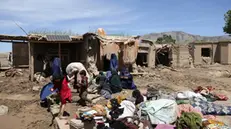 epa11337730 People affected by floods wait for relief in Borka village in Baghlan, Afghanistan, 13 May 2024. At least 342 people have died from devastating torrential rains and flooding in northern Afghanistan, with 1,630 more people injured, the Taliban government announced on 13 May. The majority of the casualties are in Baghlan province, where entire villages were submerged after heavy rains on 10 May, the Taliban's Refugee and Repatriation Ministry, overseeing emergency response, said in a statement. The Asian country is one of the world's most vulnerable to climate change and the least prepared to adapt, according to a report by the United Nations Office for the Coordination of Humanitarian Affairs (OCHA). EPA/SAMIULLAH POPAL