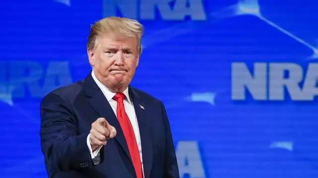 epa07530770 US President Donald J. Trump points to the audience after speaking at the 2019 National Rifle Association (NRA) Annual Leadership Forum at Lucas Oil Stadium in Indianapolis, Indiana, USA, 26 April 2019. The forum is part of the NRA convention where firearms and weapons enthusiasts will view manufacture's exhibits on all things related to firearms, protection, and hunting. EPA/TANNEN MAURY