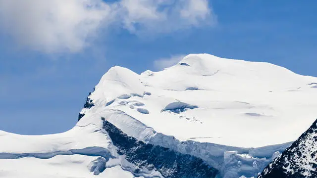 epa09980212 The Grand Combin between Sarreyer and Verbier, Switzerland, 27 May 2022. Two people died and nine others were injured in an ice collapse on the Grand Combin in the Valais on 22 May morning. The rescue forces have also evacuated other climbers. EPA/JEAN-CHRISTOPHE BOTT