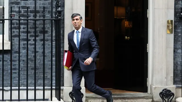 epa11360016 British Prime Minister Rishi Sunak departs his official residence, 10 Downing Street, to attend the Prime Minister's Questions (PMQs) at the Parliament in London, Britain, 22 May 2024. EPA/NEIL HALL