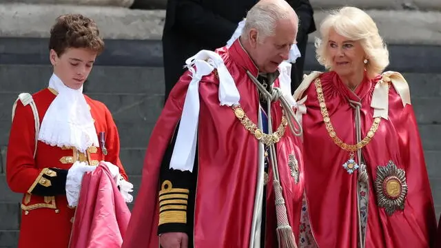 epa11341760 Britain's King Charles III (C) and Queen Camilla (R) leave following a Service of Dedication for the Order of the British Empire at St. Paul's Cathedral in London, Britain, 15 May 2024. EPA/NEIL HALL